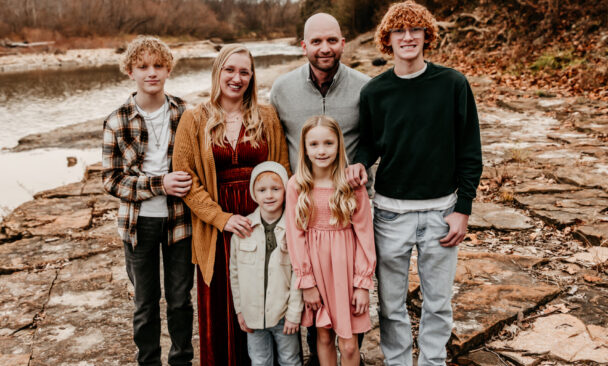 The Zahnd family by the river in 2024